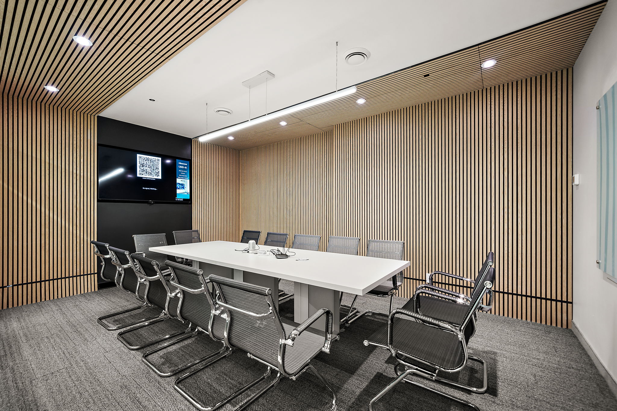 Modern Swivl boardroom with presentation screen