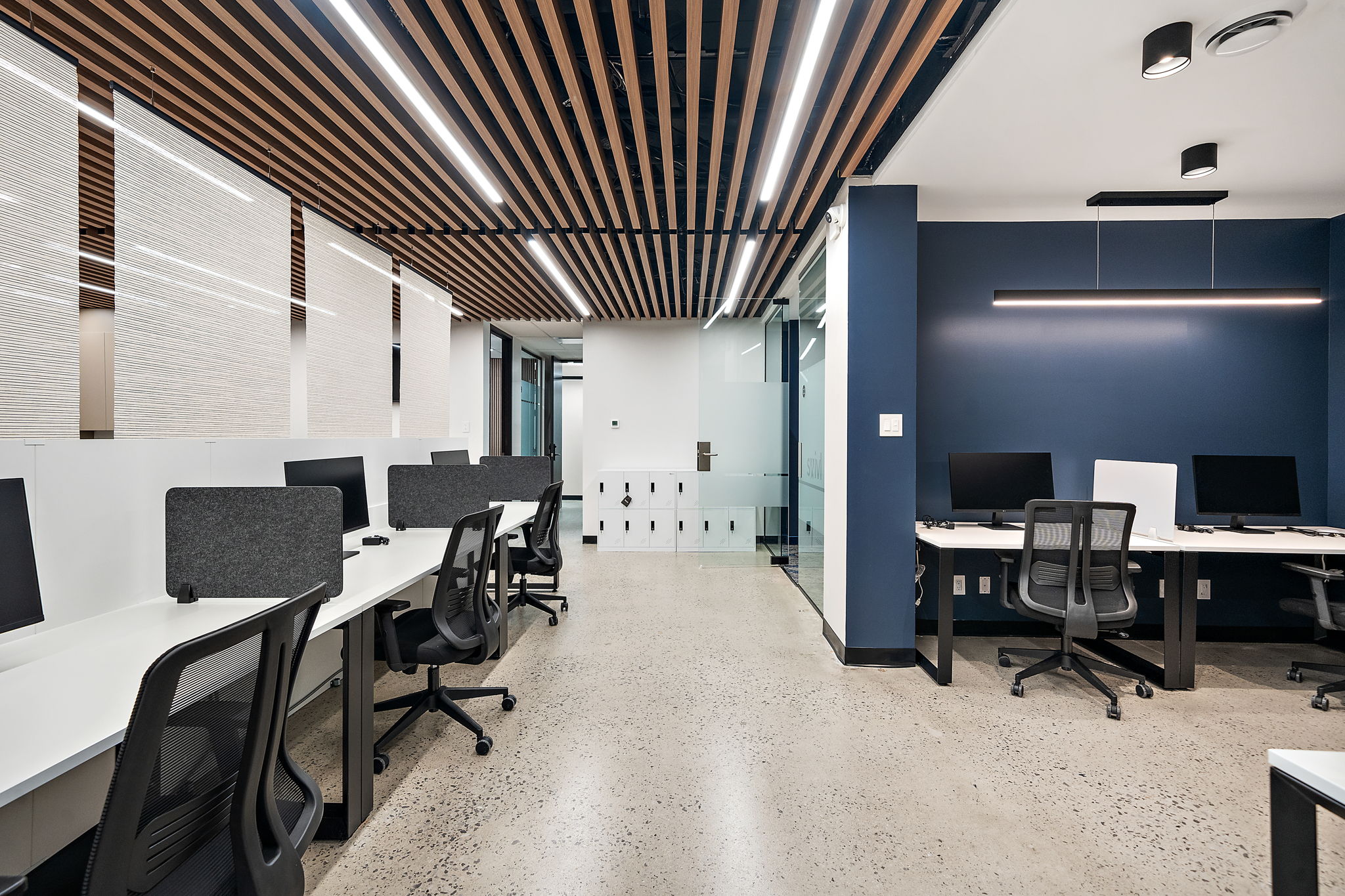 Shared coworking desks and lounge at Swivl